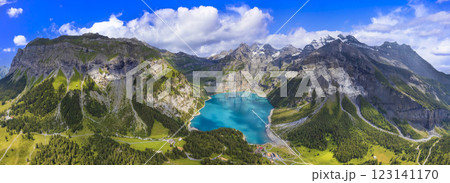 Switzerland nature scenery. Idyllic swiss mountain lake Oeschinensee (Oeschinen) with turquise water and snowy peaks of Alps mountains near Kandersteg  123141170