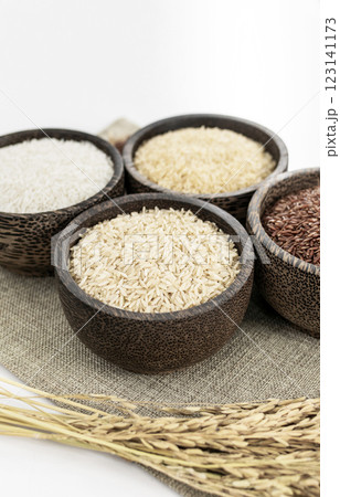 different kinds of asian rice variety grains in rustic setting display in Cambodia different kinds of asian rice variety grains in rustic setting display in Cambodia 123141173