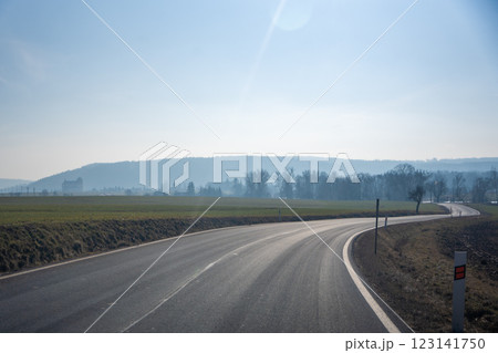 Winter view of rural road near Petrohrad, Czech Republic 123141750