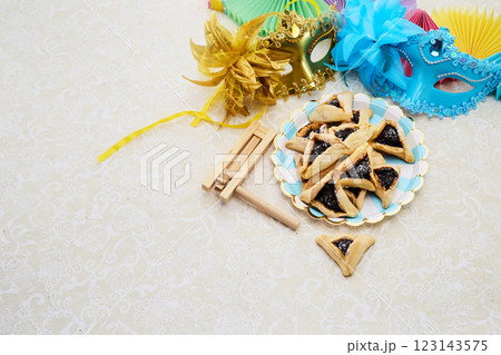 Purim Festive Setup. Colorful Purim scene with masks, 123143575