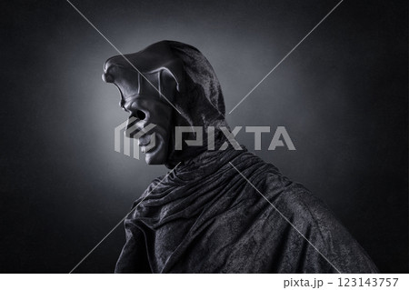 Portrait of a scary medieval clown over dark misty background with clipping path Portrait of a scary medieval clown over dark misty background with clipping path 123143757