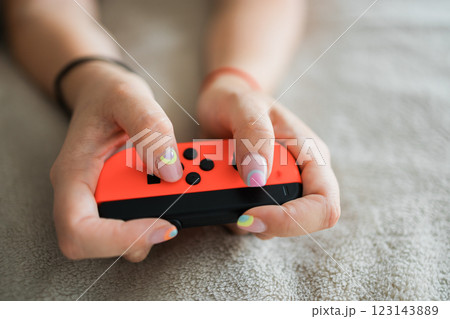 Hands using game controller. Playing video games Hands using game controller. Playing video games 123143889