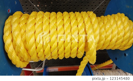A Bright Yellow Rope is Proudly Displayed on a Shelf at the Local Hardware Store A Bright Yellow Rope is Proudly Displayed on a Shelf at the Local Hardware Store 123145480