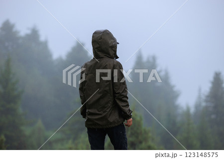 Woman enjoy the rainy forest in summer high altitude mountains Woman enjoy the rainy forest in summer high altitude mountains 123148575