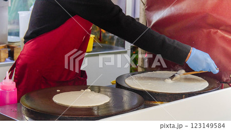 Street Food Pancake Love Irresistible Crepes Cooking on the Spot Street Food Pancake Love Irresistible Crepes Cooking on the Spot 123149584