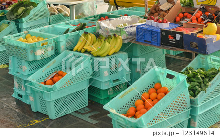 Fresh Fruits and Vegetables at Local Farmers Market in Green Plastic Crates 123149614