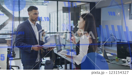 Image of data processing and diagrams over diverse colleagues discussing work Image of data processing and diagrams over diverse colleagues discussing work 123154327