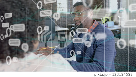 Image of ai chat over diverse colleagues discussing work in office Image of ai chat over diverse colleagues discussing work in office 123154555