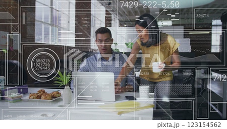 Image of data processing over diverse colleagues discussing work in office 123154562