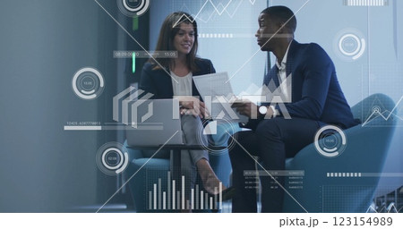 Image of financial data processing over diverse business people in office Image of financial data processing over diverse business people in office 123154989