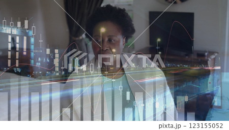 Image of financial data processing and cityscape over senior african american woman Image of financial data processing and cityscape over senior african american woman 123155052