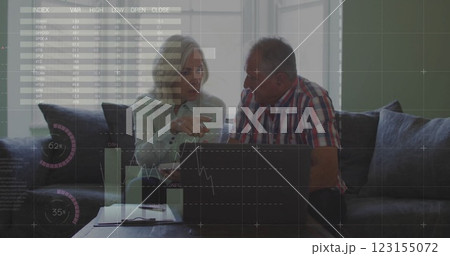 Image of financial data processing over senior caucasian couple using laptop Image of financial data processing over senior caucasian couple using laptop 123155072