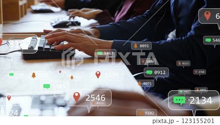 Image of social media icons with numbers over diverse colleagues typing on keyboards Image of social media icons with numbers over diverse colleagues typing on keyboards 123155201