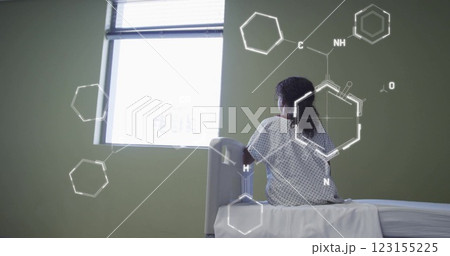 Image of scientific data processing over biracial woman in hospital bed 123155225