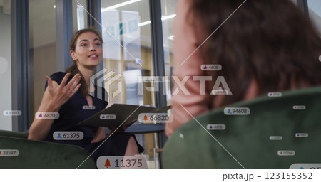 Image of data processing over caucasian businesswomen talking in office 123155352