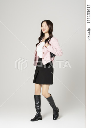 MZ employee in his 20s wearing a casual suit to work 123155615