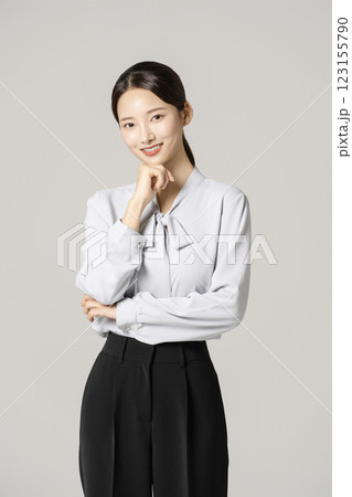 A woman in her 20s wearing a suit who successfully found a job A woman in her 20s wearing a suit who successfully found a job 123155790