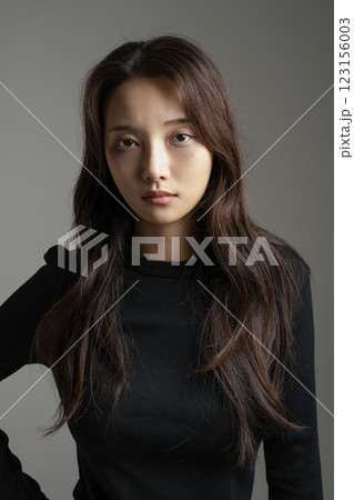 A woman in her 20s exhausted from depression A woman in her 20s exhausted from depression 123156003