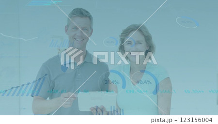 Analyzing financial data on tablet, business people over stock market charts and graphs image 123156004