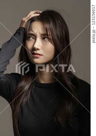 A woman in her 20s exhausted from depression 123156017