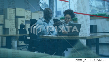Business professionals discussing data over financial analysis image in office Business professionals discussing data over financial analysis image in office 123156129