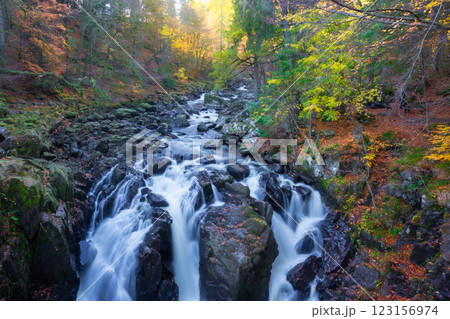 The Hermitage is a woodland walk with stunning views of the waterfall, river, and a great place to enjoy and take in nature and the relaxing atmosphere especially in autumn, Dunkeld, Perth, Scotland The Hermitage is a woodland walk with stunning views of the waterfall, river, and a great place to enjoy and take in nature and the relaxing atmosphere especially in autumn, Dunkeld, Perth, Scotland 123156974