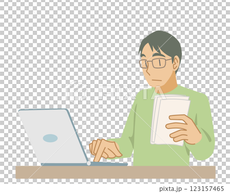 A man entering data into a laptop 123157465