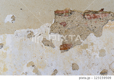 Close-up view of old damaged plaster. Abstract background for various uses. 123159509