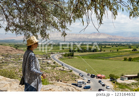 Exploring the scenic beauty of a valley while basking in the warm sunlight with a curious spirit Exploring the scenic beauty of a valley while basking in the warm sunlight with a curious spirit 123164632