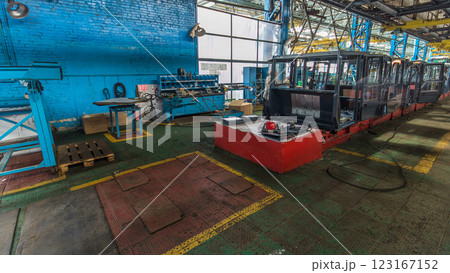 Conveyor assembly stage the body of tractor at big industrial factory timelapse 123167152