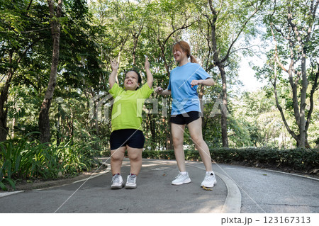 Inclusive Fitness: Young Women Embrace Diversity and Friendship in Outdoor Exercise Session Inclusive Fitness: Young Women Embrace Diversity and Friendship in Outdoor Exercise Session 123167313
