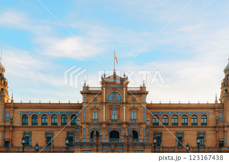 Historic plaza de Espana building with spanish flag under clear blue sky. Spain Square, Plaza de 123167438