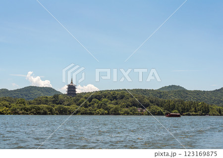 Scenic Hangzhou West Lake with Historic Leifeng Pagoda and Lush Forests 123169875