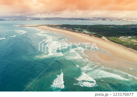 Aerial view of seascape in the evening. Seacoast of Costa da Caparica city. View of Lisbon. Almada, Portugal 123170077