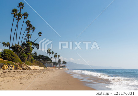 A breathtaking view of the California coast featuring golden sandy beaches, the vast blue ocean 123170331
