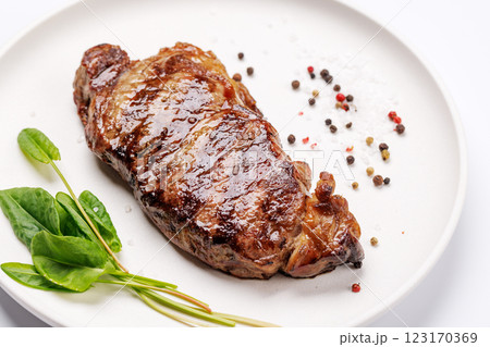 A perfectly cooked striploin steak with a juicy, tender texture 123170369