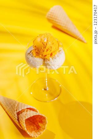 A refreshing ice cream set against a vibrant yellow background 123170417