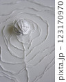 the spiral pattern of the white thread with white ball 123170970