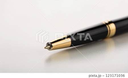 close up of a pen, A sleek black ballpoint pen with silver accents resting on a reflective white surface, pen is elegance, making it suitable for business, office, writing, and productivity themes close up of a pen, A sleek black ballpoint pen with silver accents resting on a reflective white surface, pen is elegance, making it suitable for business, office, writing, and productivity themes 123171036