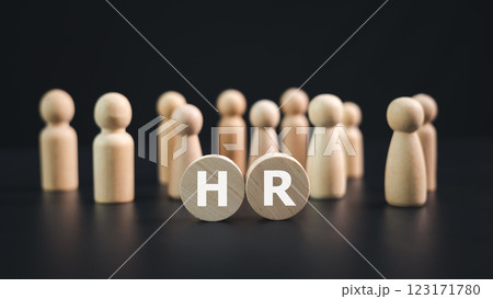 Hr, HRM, Human resources management recruitment concept, HR letters on a wooden plate with wooden dolls on a black background, Teamwork leadership concept, Recruitment and customer target group. 123171780