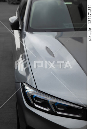 Detail of luxury grey car headlights lamp, modern car front lamp Detail of luxury grey car headlights lamp, modern car front lamp 123171854