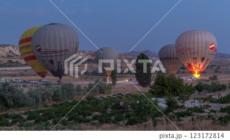 Beautiful colorful hot air balloons take off and flying in clear morning sky timelapse in Cappadocia, Turkey Beautiful colorful hot air balloons take off and flying in clear morning sky timelapse in Cappadocia, Turkey 123172814