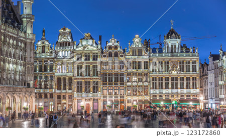 Illuminated Grand Place Guilds facade day to night timelapse in Brussels, Belgium. 123172860