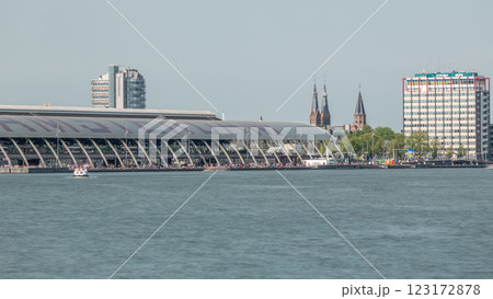 Close up view of Amsterdam Central Station with its curved roof and the Amstel River timelapse. Amsterdam, Netherlands 123172878