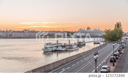 Ship and boats docked along the Garonne River day to night timelapse in Bordeaux, France Ship and boats docked along the Garonne River day to night timelapse in Bordeaux, France 123172890