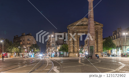 Porte d'Aquitaine arch and obelisk at Place de la Victoire night timelapse in Bordeaux, France. Porte d'Aquitaine arch and obelisk at Place de la Victoire night timelapse in Bordeaux, France. 123172902