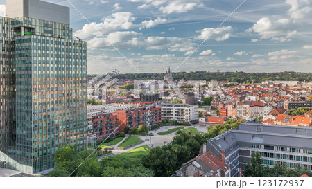 Aerial timelapse of Brussels urban landscape blending office skyscrapers with residential areas. 123172937