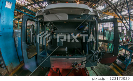 Conveyor assembly stage the body of tractor at big industrial factory timelapse 123173029