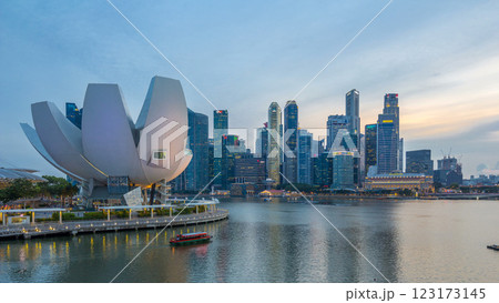 Art Science museum day to night timelapse and skyscrapers skyline city of Singapore. Art Science museum day to night timelapse and skyscrapers skyline city of Singapore. 123173145