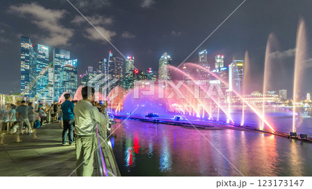 Light and Water Show along promenade in front of Marina Bay Sands timelapse 123173147